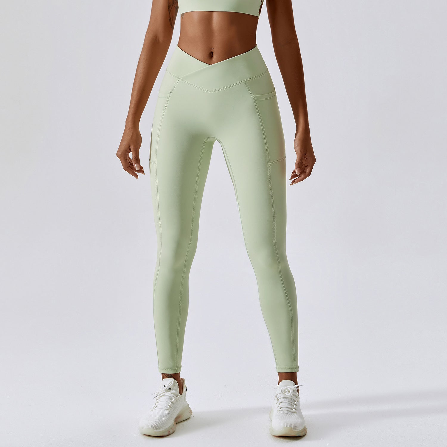 Push-Up Sportleggings mit Cross-Bund
