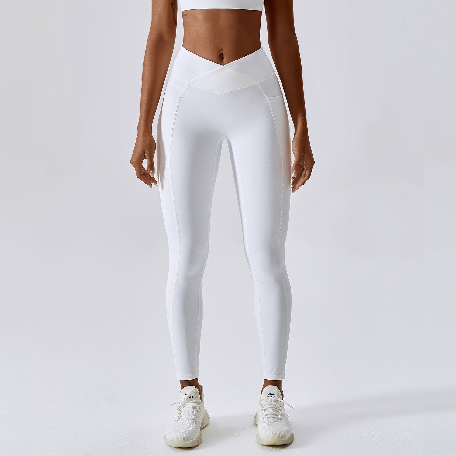 Push-Up Sportleggings mit Cross-Bund